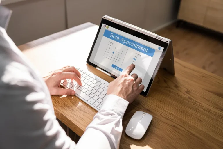 Booking a healthcare appointment on a laptop