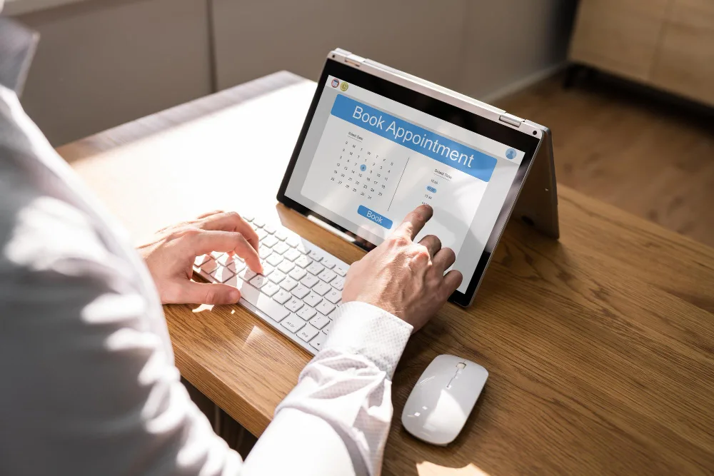 Booking a healthcare appointment on a laptop